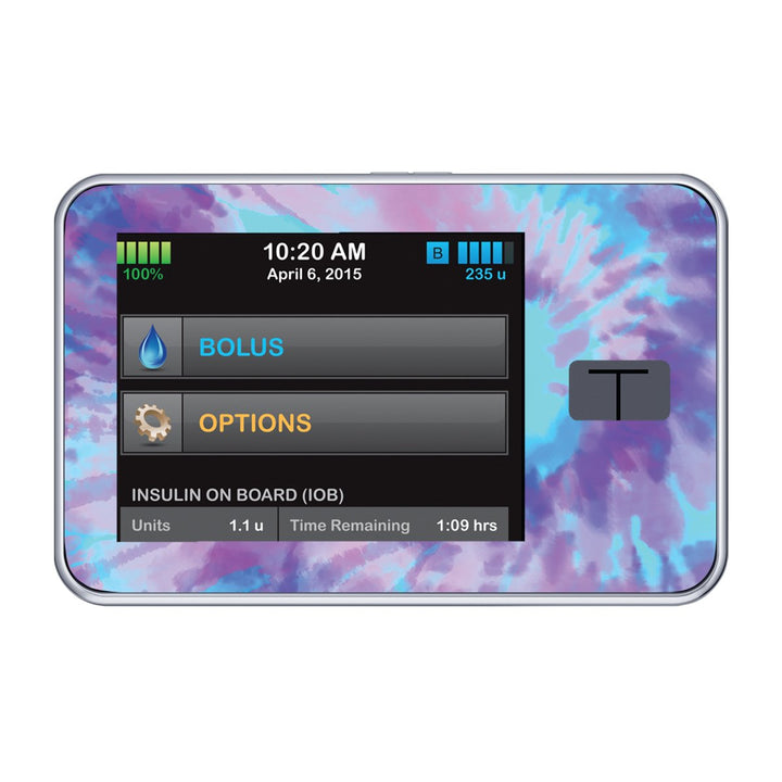 A pastel purple, blue, and pink sticker in a tie-dye pattern on the Tandem t-slim device.