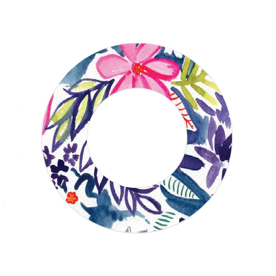 Adhesive tape with navy blue, pink, and orange flowers with green leaves in a watercolor texture for the Libre Freestyle sensor.